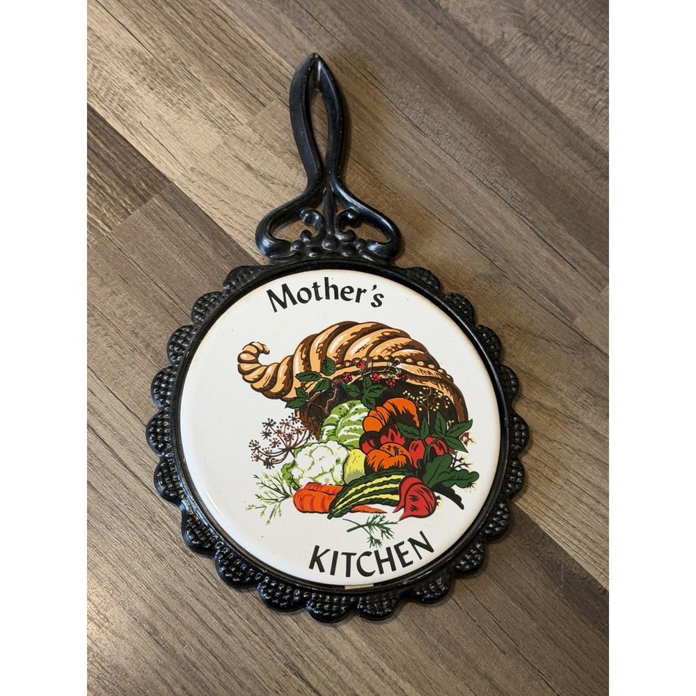Vintage Mother's Kitchen Black And Ceramic Trivet. With A Cornucopia Design